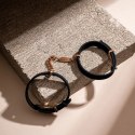 Crave ID Cuffs mankiety skorzane czarne z elementami rożowego złota
