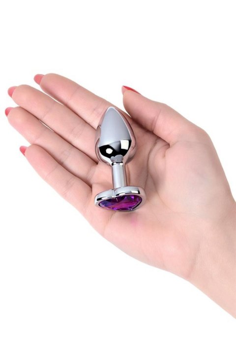 Silver anal plug with purple gem heart-shaped Silver anal plug with purple gem heart-shaped