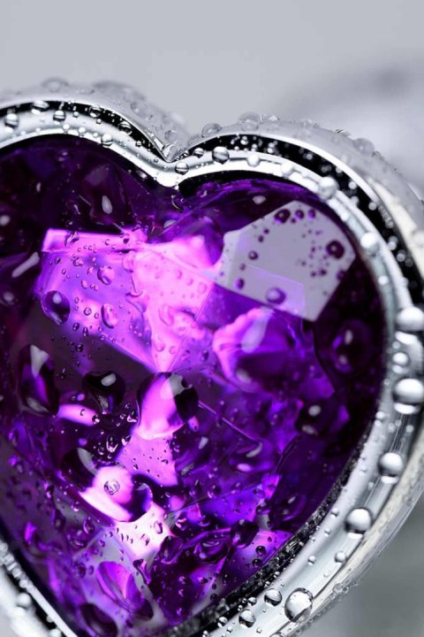 Silver anal plug with purple gem heart-shaped Silver anal plug with purple gem heart-shaped