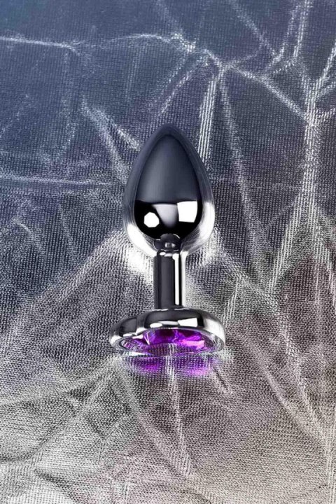 Silver anal plug with purple gem heart-shaped Silver anal plug with purple gem heart-shaped